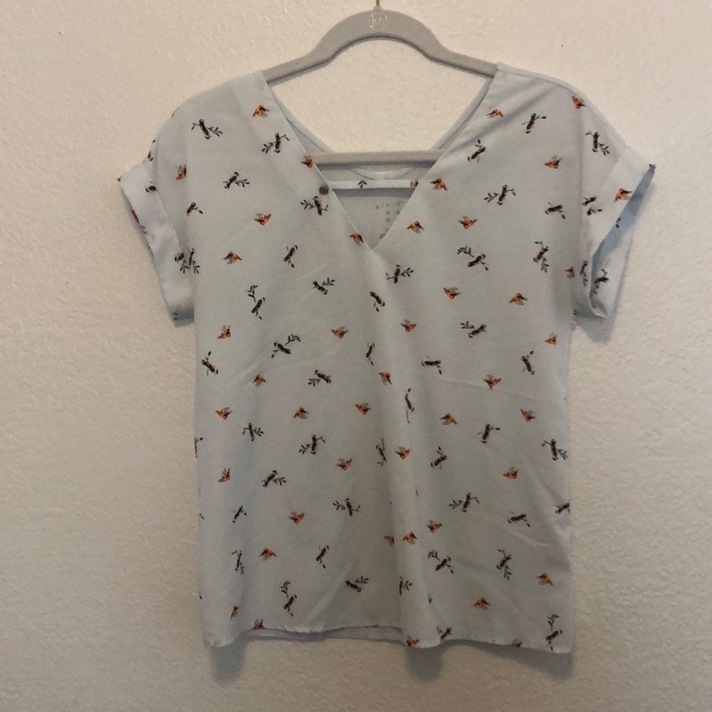 Light blue top